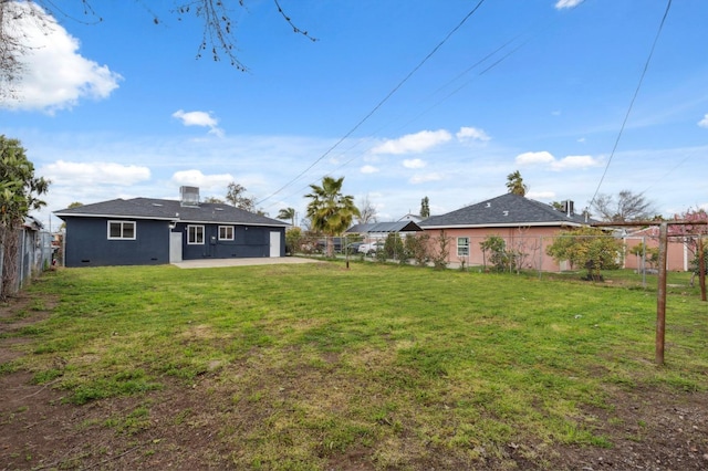 view of yard with a patio area and a fenced backyard