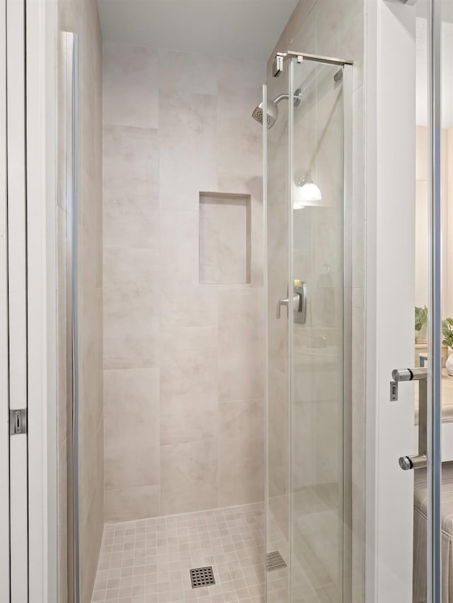 full bathroom with a stall shower