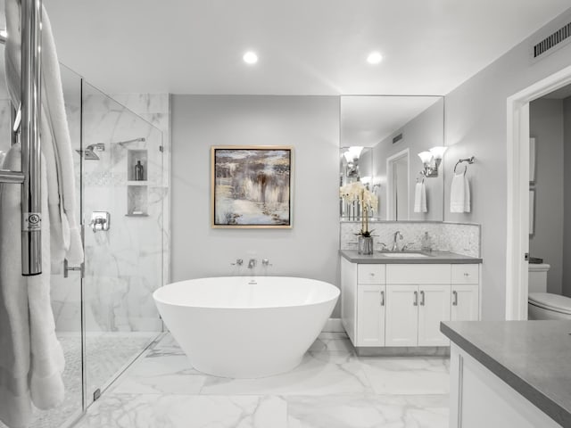 full bath featuring a marble finish shower, visible vents, marble finish floor, and vanity