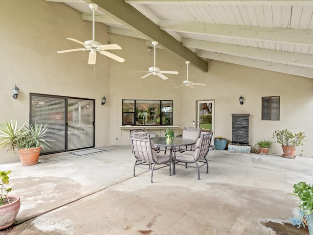 view of patio / terrace with outdoor dining space and a ceiling fan