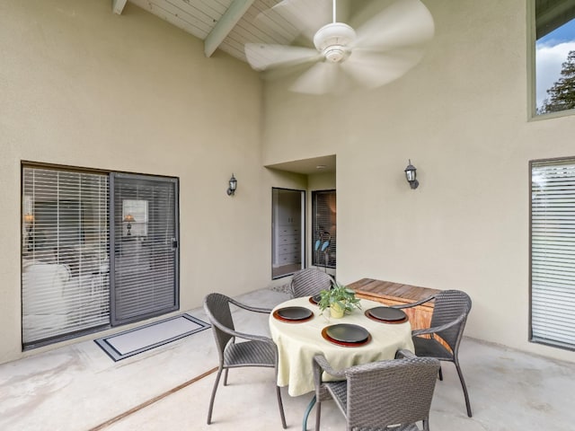 view of patio / terrace with ceiling fan and outdoor dining space