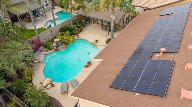 view of swimming pool featuring a patio area, a fenced in pool, and a fenced backyard