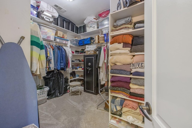 spacious closet with visible vents and carpet