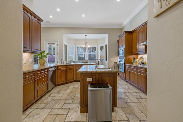 kitchen featuring a sink, backsplash, stone tile flooring, stainless steel appliances, and crown molding