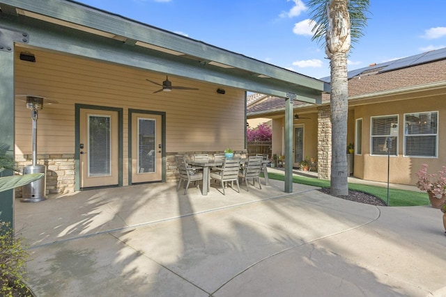 view of patio / terrace featuring outdoor dining space and ceiling fan