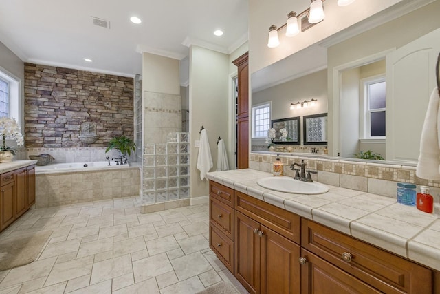 bathroom with a bath, a walk in shower, visible vents, and ornamental molding