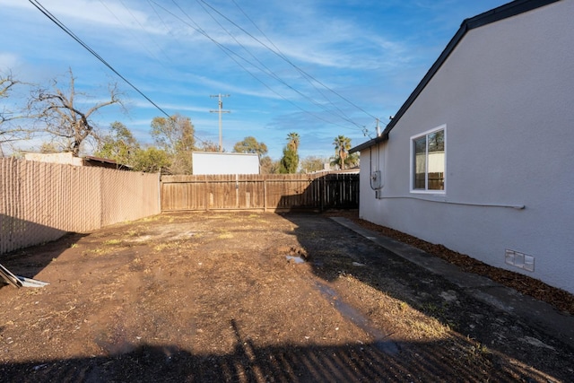 view of yard featuring a fenced backyard