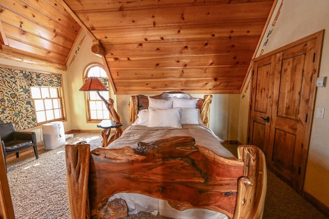 bedroom featuring wooden ceiling, baseboards, lofted ceiling, and carpet