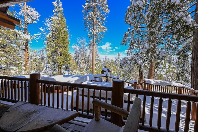 view of snow covered deck