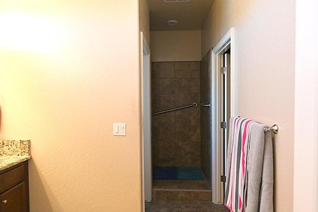 bathroom with visible vents and vanity