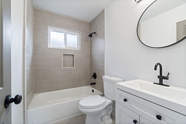 full bath featuring toilet, vanity, and  shower combination