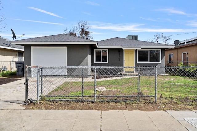 view of front of home with a garage, a fenced front yard, concrete driveway, and stucco siding