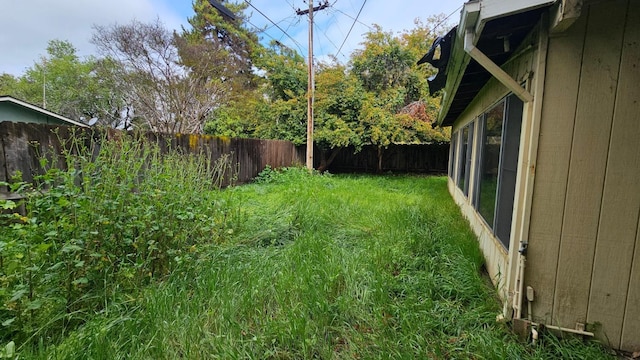 view of yard featuring a fenced backyard