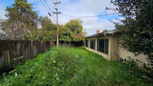 view of yard with fence