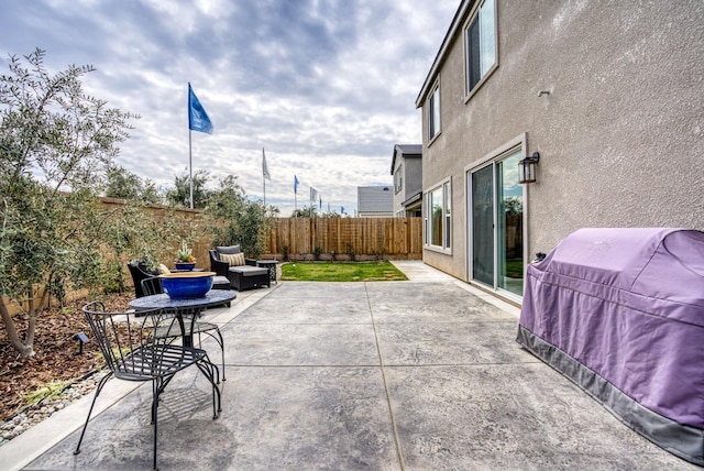 view of patio / terrace with a fenced backyard