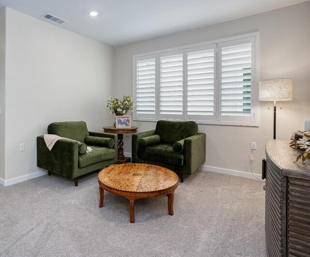 1093 Traverse Dr S, Madera, CA 93636 - sitting room featuring light colored carpet, baseboards, visible vents, and plenty of natural light