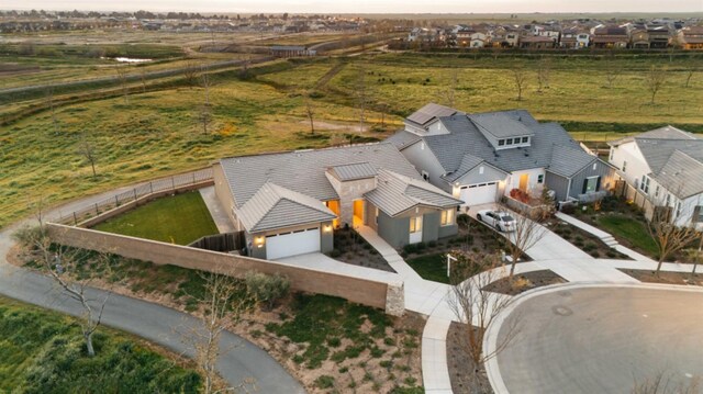birds eye view of property featuring a residential view and a rural view