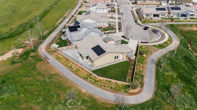 birds eye view of property with a residential view