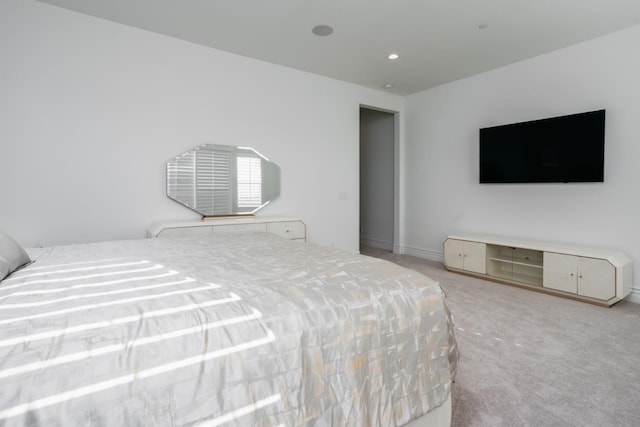 carpeted bedroom with recessed lighting