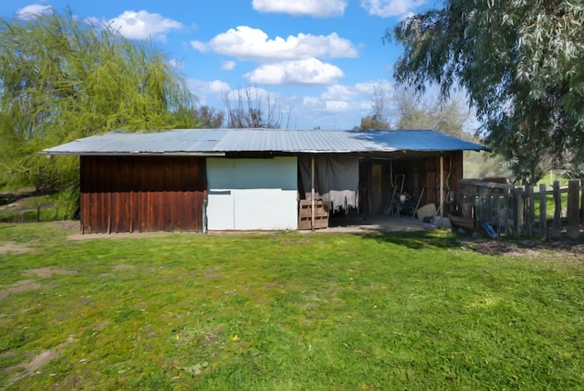 view of outbuilding with an exterior structure and an outdoor structure