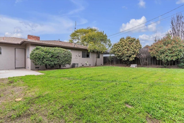 view of yard with a patio area and fence