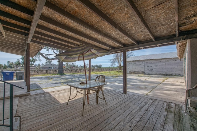 deck with a patio and fence