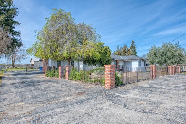 view of front of house with a gate and a fenced front yard