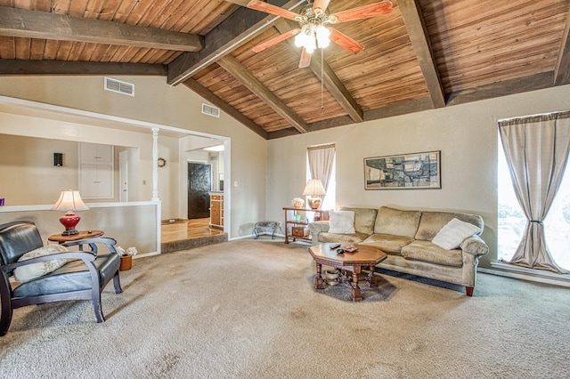 living area featuring visible vents, beam ceiling, carpet, wooden ceiling, and ceiling fan