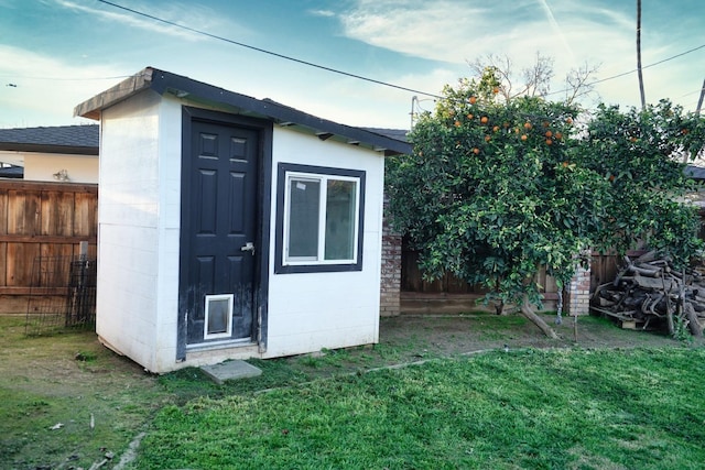 view of shed with a fenced backyard