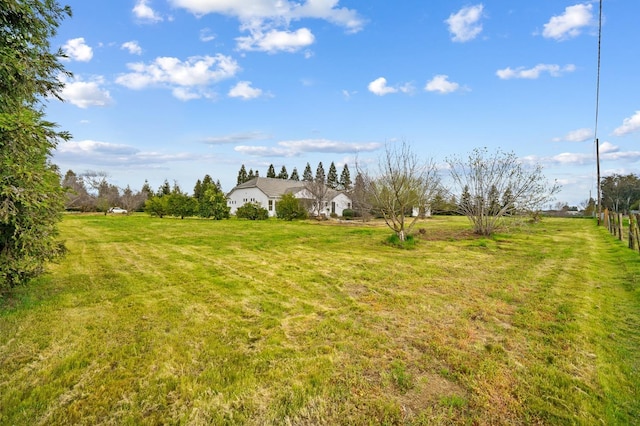 view of yard with a rural view