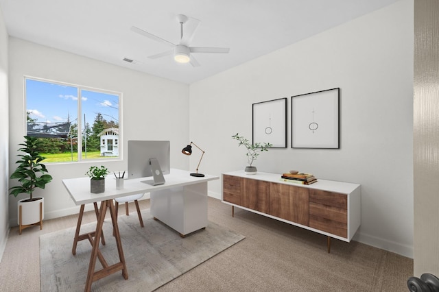 home office with visible vents, baseboards, and ceiling fan