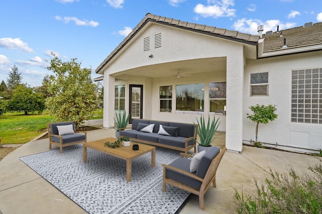 view of patio with an outdoor hangout area and ceiling fan