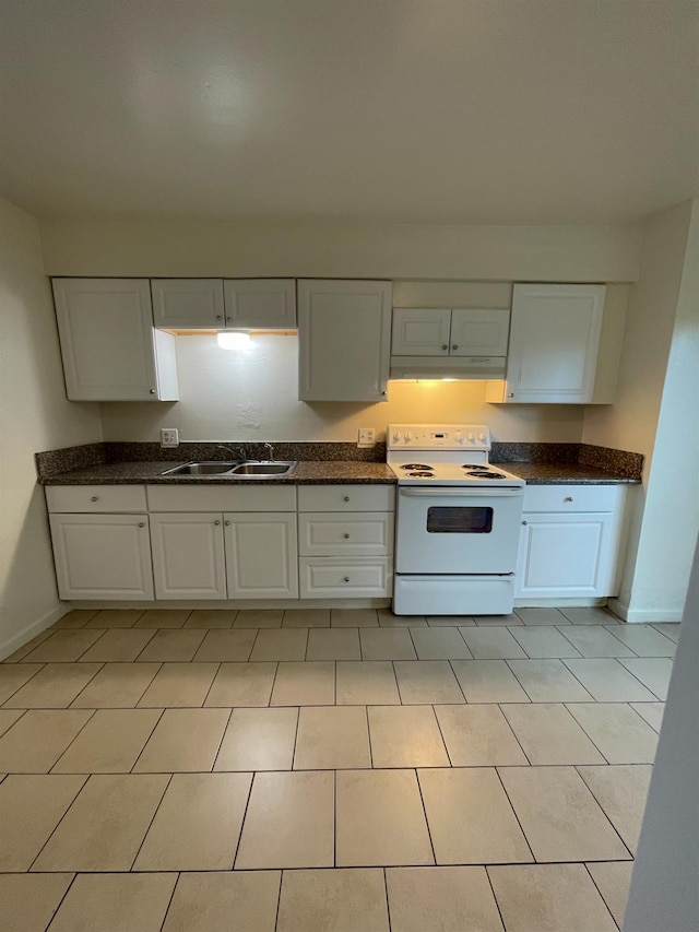 4421 E Hedges Ave, Fresno, CA 93703 - kitchen featuring baseboards, white cabinets, a sink, and white range with electric stovetop