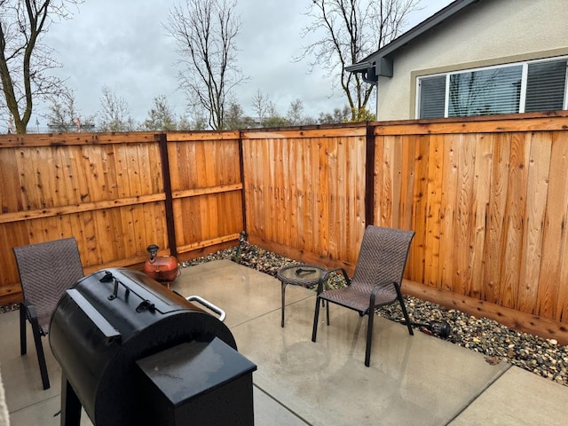 view of patio with fence