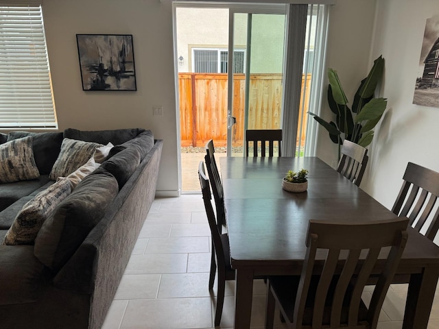 dining room featuring light tile patterned floors