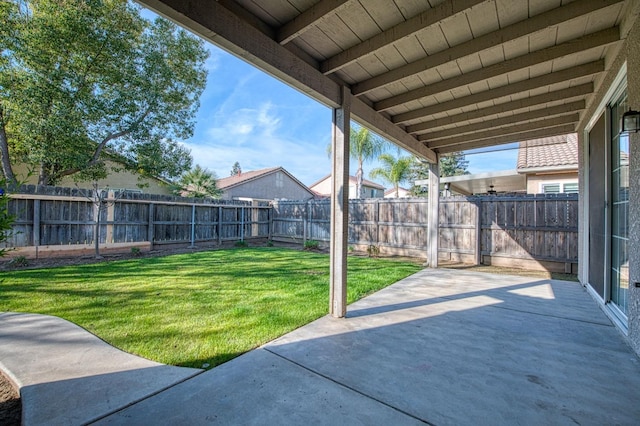 view of yard featuring a fenced backyard and a patio area