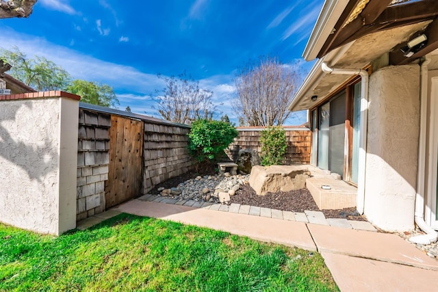 view of yard featuring fence