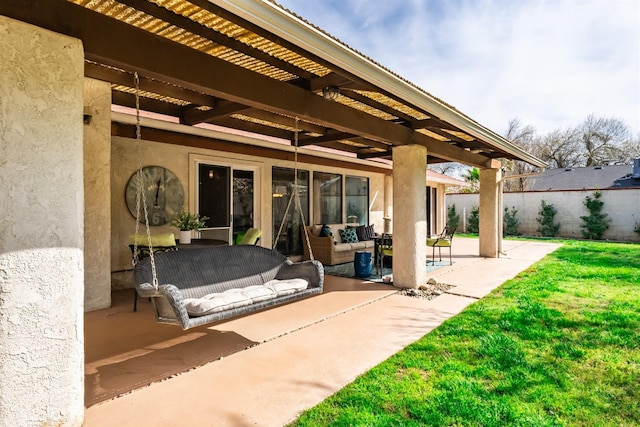 view of patio / terrace featuring an outdoor living space, fence, and a pergola