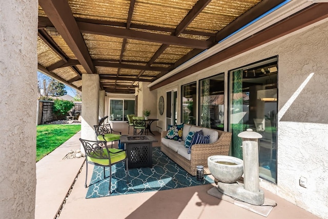 view of patio / terrace featuring an outdoor living space, a pergola, and fence