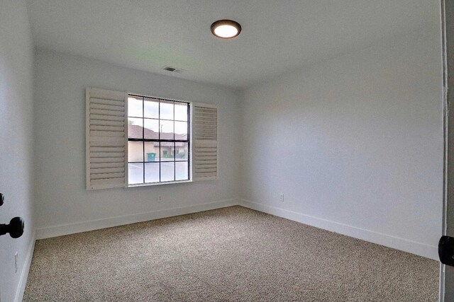 1010 S Clovis Ave Unit 101, Fresno, CA 93727 - carpeted spare room featuring baseboards