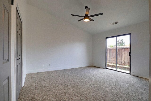 1010 S Clovis Ave Unit 101, Fresno, CA 93727 - empty room with carpet flooring, vaulted ceiling, a ceiling fan, and baseboards
