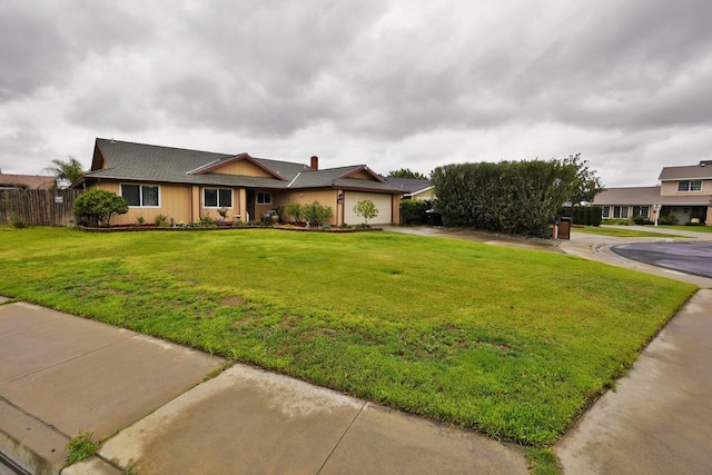 465 Mike Ct, Lemoore, CA 93245 - single story home with an attached garage, concrete driveway, and a chimney