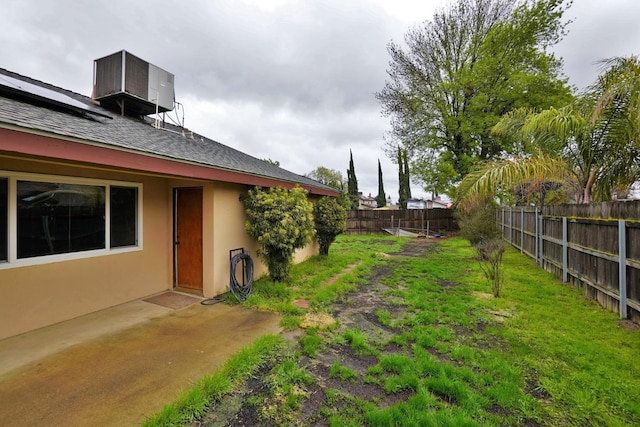 465 Mike Ct, Lemoore, CA 93245 - fenced backyard featuring central AC unit