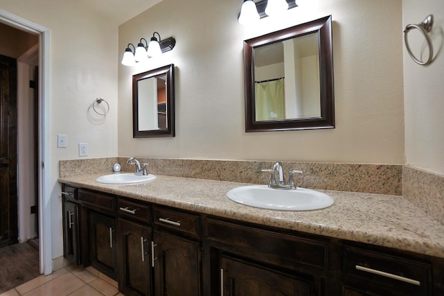 465 Mike Ct, Lemoore, CA 93245 - bathroom with double vanity and tile patterned floors