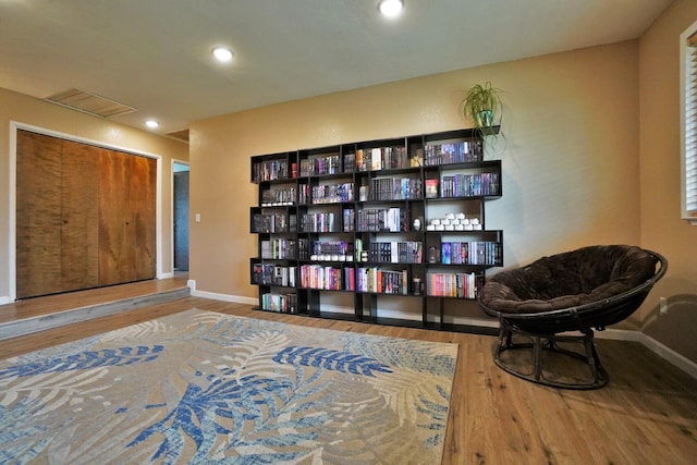 465 Mike Ct, Lemoore, CA 93245 - sitting room with wood finished floors, baseboards, and recessed lighting