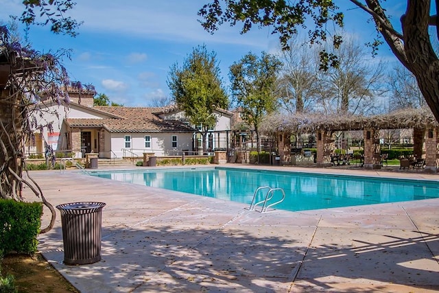 community pool featuring a patio