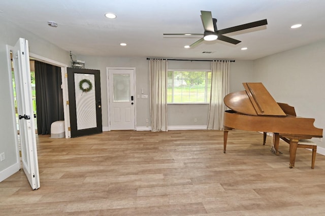 foyer with light wood-style floors, baseboards, ceiling fan, and recessed lighting