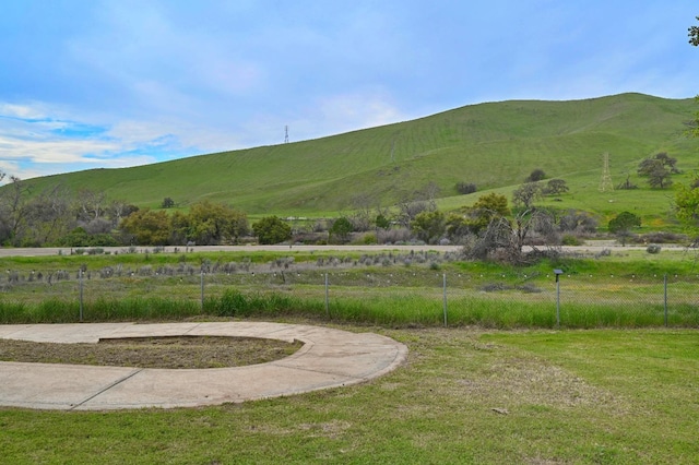 mountain view featuring a rural view