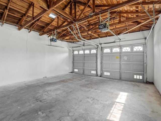 9414 E Belmont Ave, Sanger, CA 93657 - garage featuring a garage door opener