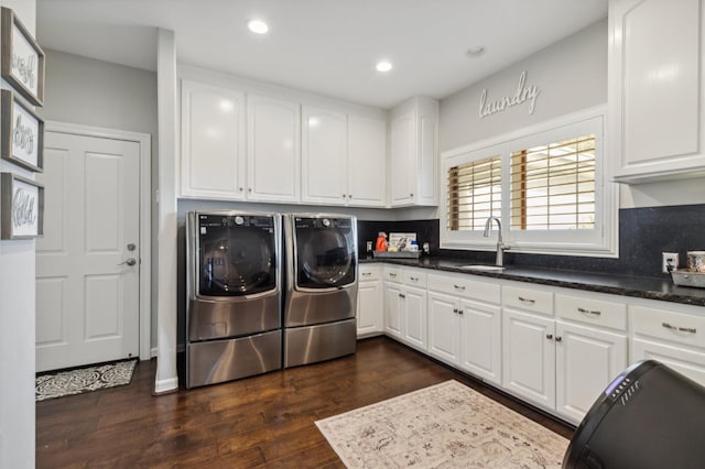 6136 E S Bear Creek Dr, Merced, CA 95340 - laundry room featuring cabinet space, washer and clothes dryer, dark wood-type flooring, and recessed lighting